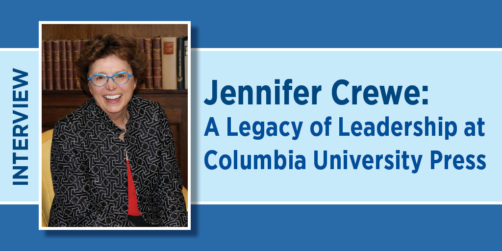 Banner image for an interview titled “Jennifer Crewe: A Legacy of Leadership at Columbia University Press.” On the left, a smiling woman with short brown hair and blue glasses sits in front of bookshelves, wearing a black patterned jacket over a red top. On the right, large blue text displays the interview title. A vertical sidebar on the left reads “INTERVIEW.”